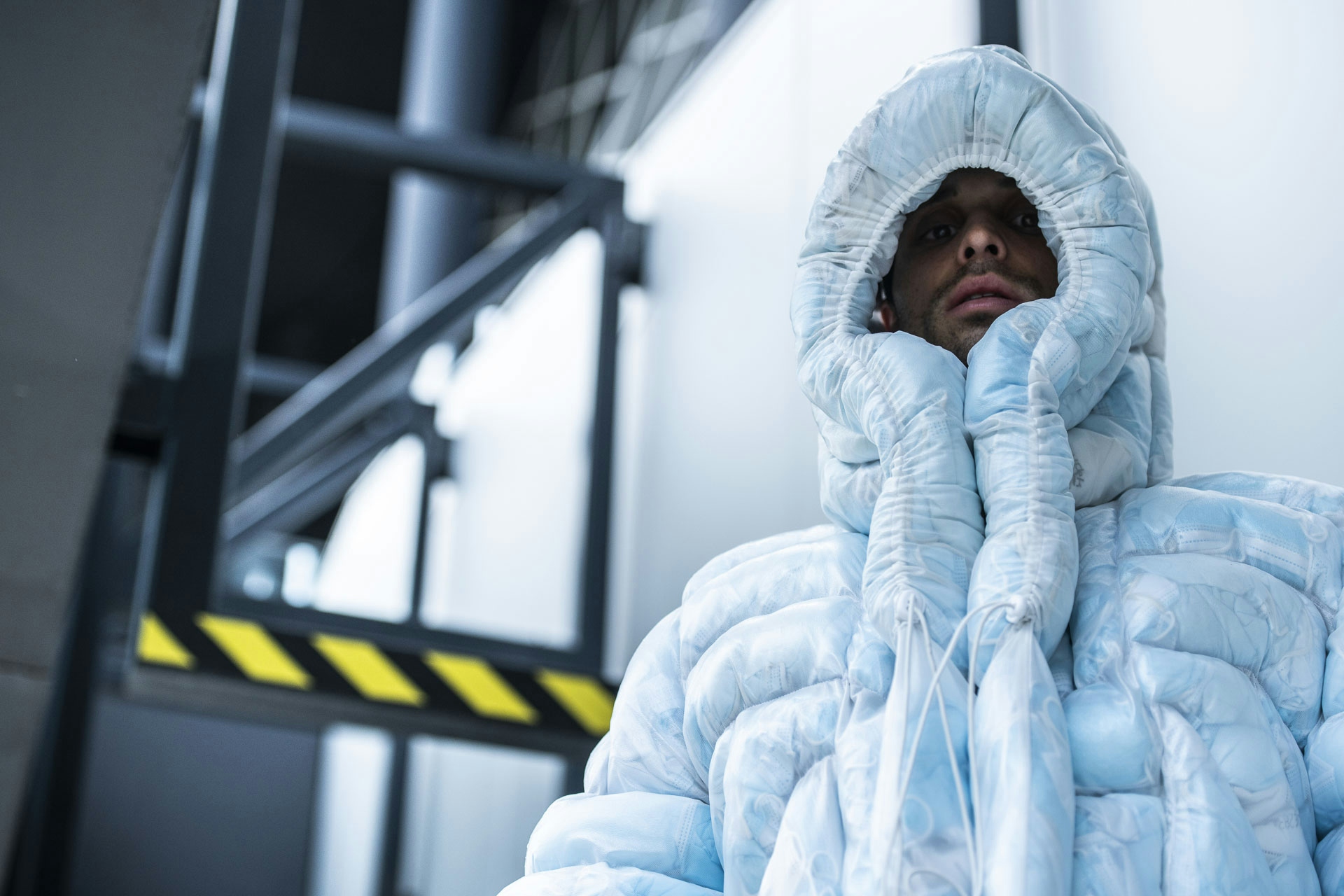 Coat-19 is a puffer jacket filled with single-use masks collected from the streets that wants to highlight the absurd pandemic-related pollution
