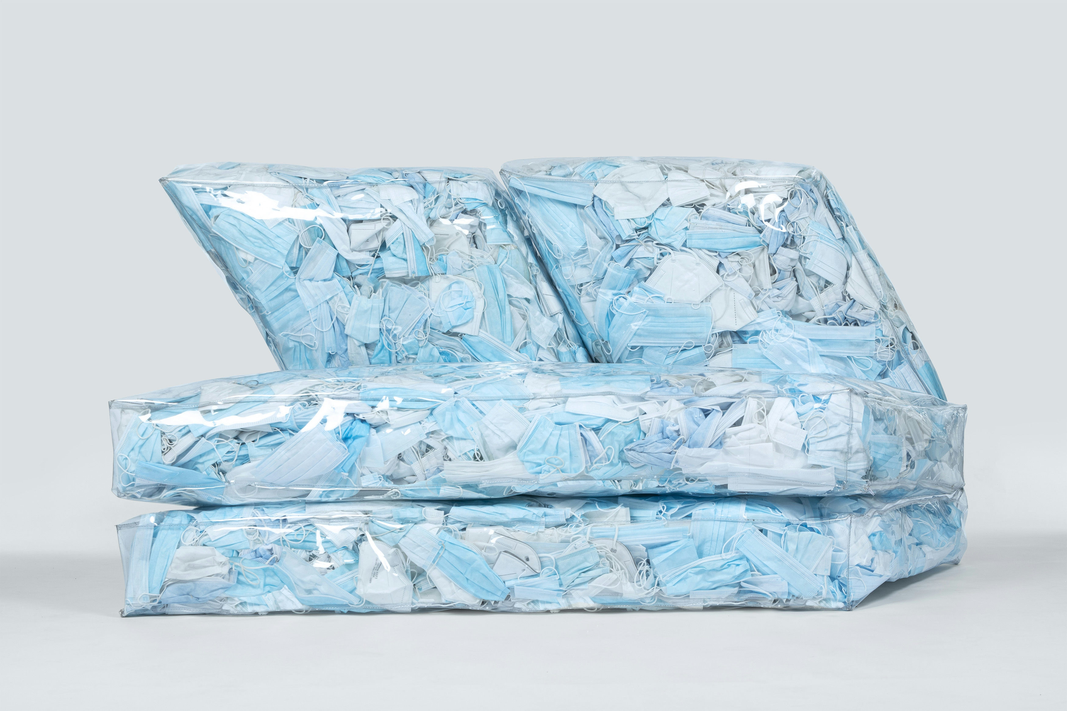 Couch-19 - An iceberg-shaped modular pouf made with single-use masks collected from the streets