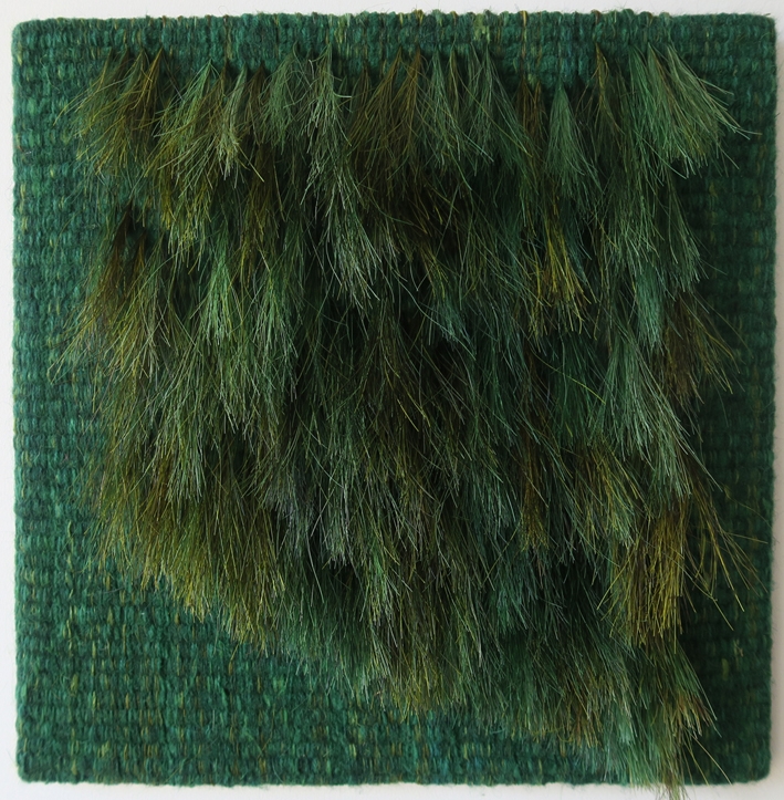 Becomimg green 2016.
35 x 35 cm.
Wool, linen,horsehair.